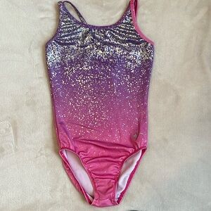 Destira Leotard. Good condition. Child Medium (8). Pink/Purple w Silver foiling.